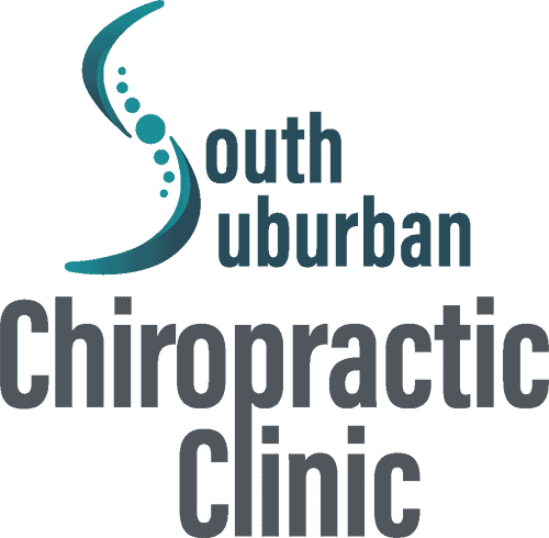 Chiropractor performing spinal adjustment at South Suburban Chiropractic Clinic.