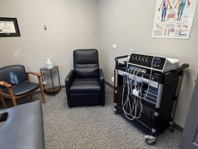 Chiropractic treatment equipment in a modern clinic setting.